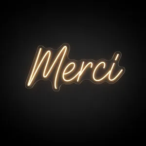 Néon LED Merci blanc chaud, sur plaque en acrylique transparent découpée à la forme