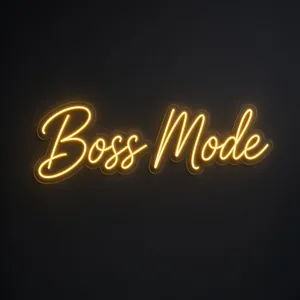Néon LED Boss Mode em amarelo quente sobre placa de acrílico transparente recortada