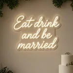 Néon LED Eat Drink and Be Married allumé, mis en situation dans un intérieur