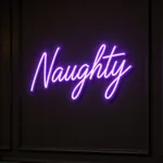 Tent LED-neonskilt Naughty i et interiør