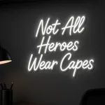 Néon LED Not All Heroes Wear Capes allumé, mis en situation dans un intérieur