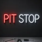 Leuchtendes LED-Neonschild Pit Stop in einem Wohnraum