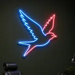Néon LED Swallow aceso num ambiente interior